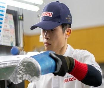 Competition scene in the automotive sheet metal work section, where the Gold Prize was awarded